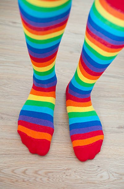 istock Legs in striped socks stockings 471827657