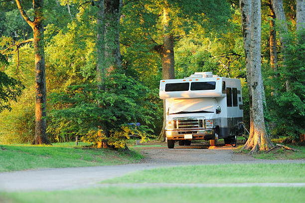 istock Motorhome in campground at sunset 471830007