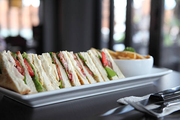 istock Club sandwich with on wood background 471830631