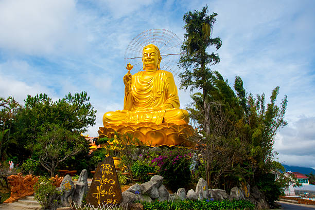 istock Religious monument, seated gold Buddha 471831744