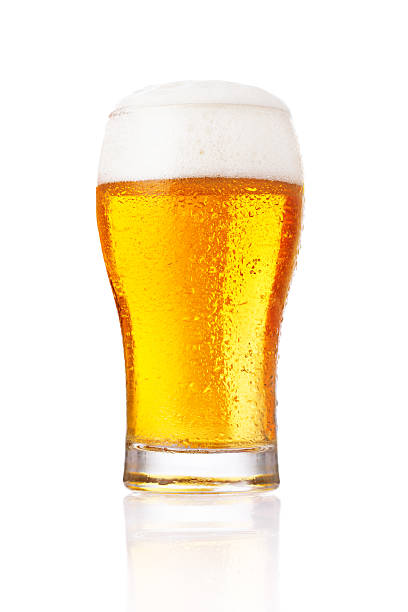 istock Tall glass of beer with thick foam on a white background 471832172