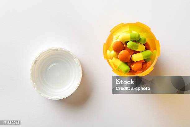 Capsule Medicine Pills In The Pill Bottle Stock Photo - Download Image Now - Bottle, Box - Container, Capsule - Medicine