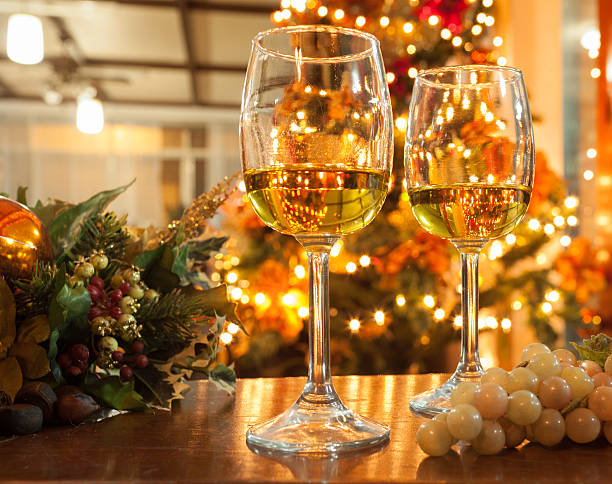 istock Wineglasses against Christmas Lights 471832751