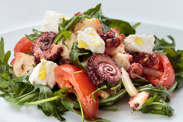 istock Octopus salad with rucola, olives and feta cheese 471833014