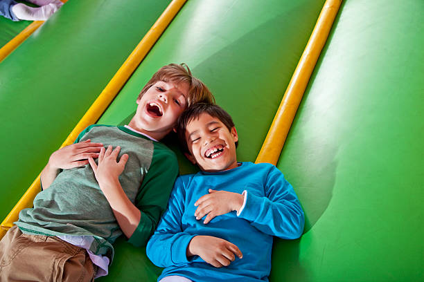 istock Boys in bounce house 471833133