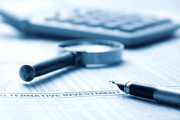 istock Fountain pen on financial newspaper 471833630