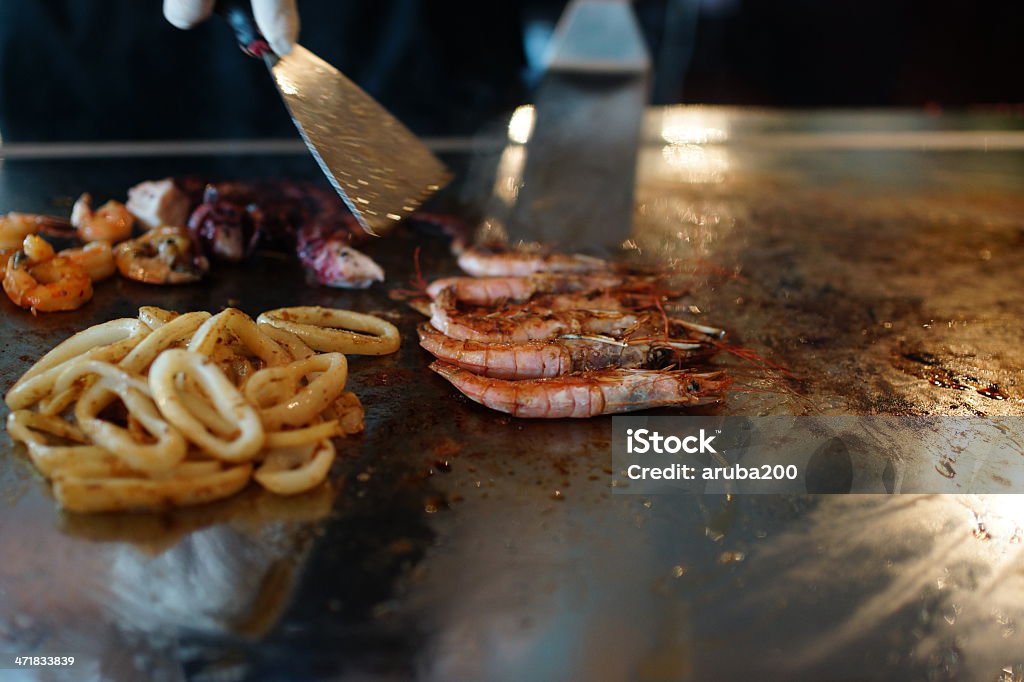 Los pescados y mariscos y su preparación. - Foto de stock de Adulto libre de derechos