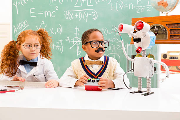 istock Education:  Retro revival children making robot in science lab. 471834681