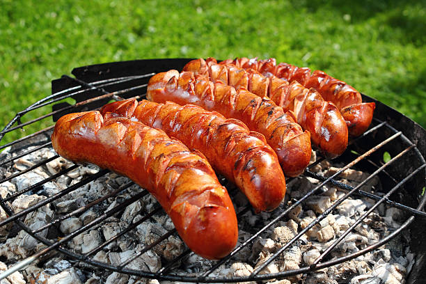 istock Grilling Sausages on barbecue grill 471834975