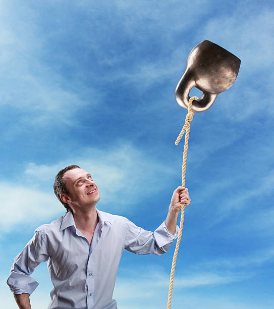 istock Strange dreamy man with a kettlebell 471837028