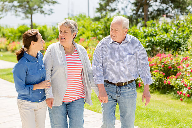 istock Senior couple with caregiver 471838181
