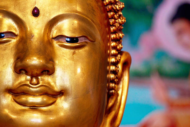 istock beautiful face of Buddha image 471839521