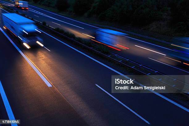 On The Road Stock Photo - Download Image Now - Black Color, Blue, Blurred Motion