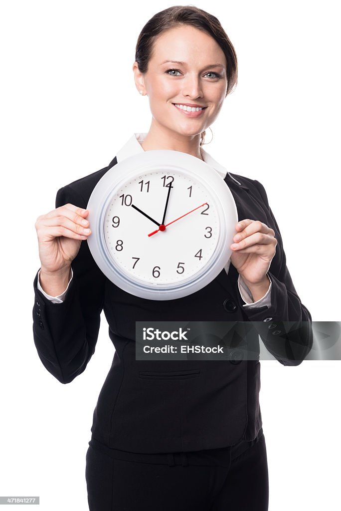 Jeune femme d'affaires avec horloge isolé sur fond blanc - Photo de 10 heures libre de droits
