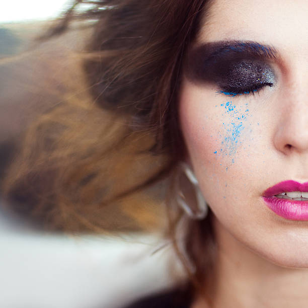istock The woman with a creative smoky eyes make-up 471842354