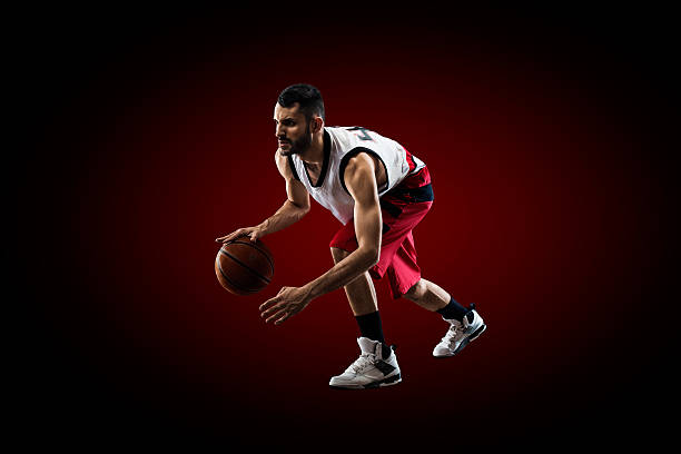 istock Basketball player in action is flying high 471842376
