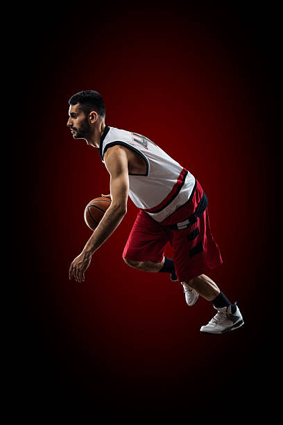 istock Basketball player in action is flying high 471842388
