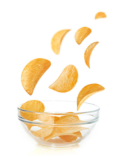 istock Bowl of potato chips isolayed on white 471842565