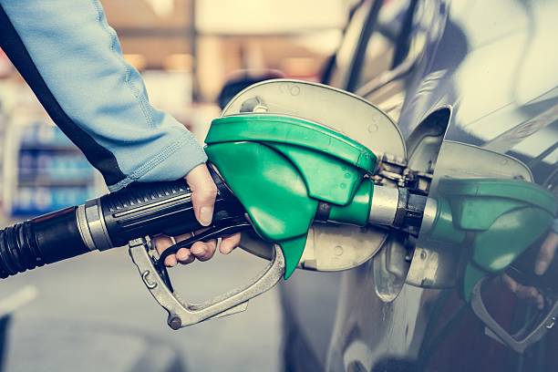 istock Punping gas at gas station. 471843740