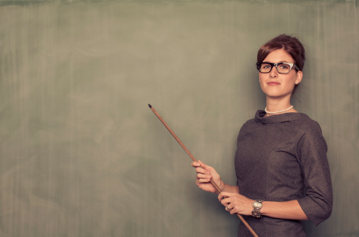 A retro teacher is ready to teach the lesson. Are you prepared to take notes?