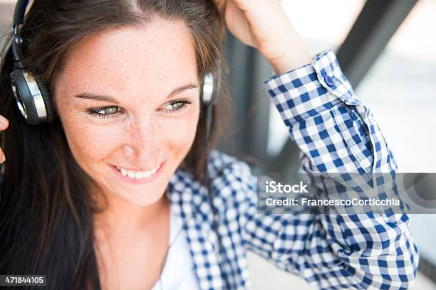 Young Happy Woman With Ear Phone Stock Photo - Download Image Now - 20-24 Years, Adolescence, Adult