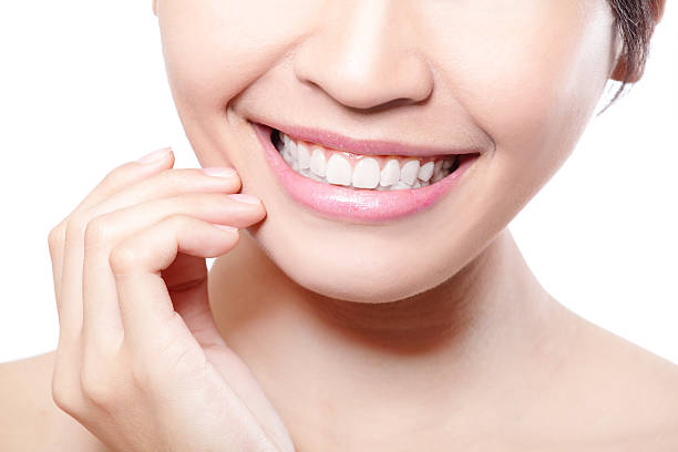 istock Beautiful young woman teeth close up 471845787