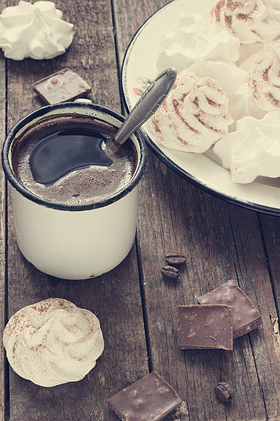 istock white meringue on a dark wooden background retro 471847408