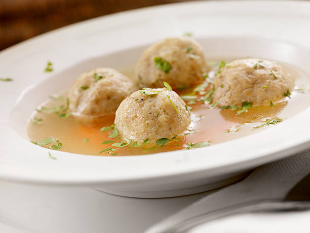 matzah ball soup - kartoffelknödel essen stock-fotos und bilder