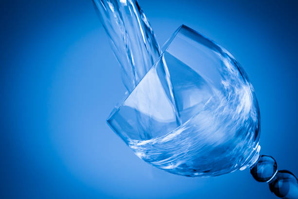 istock Water splashing in a blue glass 471848101
