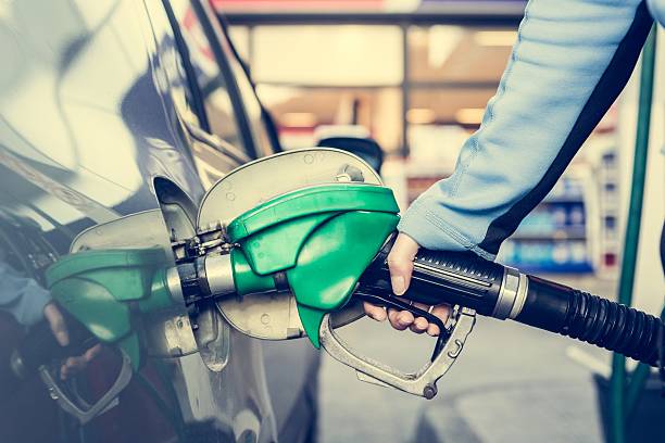 istock Punping gas at gas station. 471851404