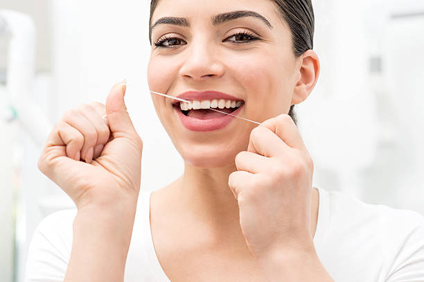 istock Floss its help me to care my teeth. 471851594