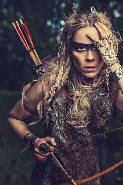 Beautiful northern elf warrior princess with bow and arrows