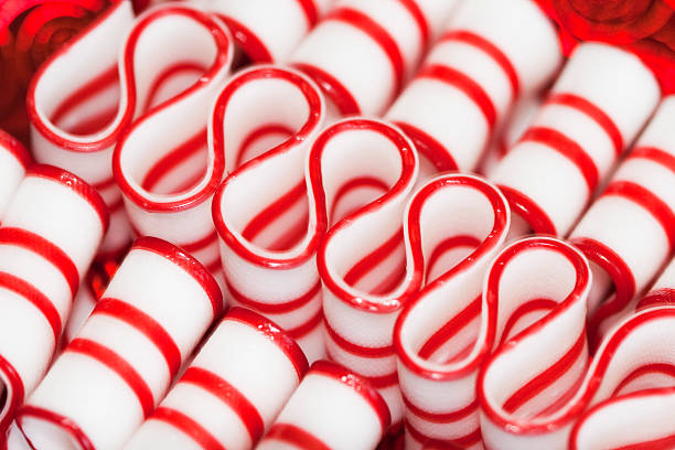 Candy canes striped red, 3d illustration, horizontal, isolated, over white