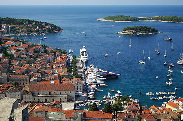 istock Big yacht in Hvar harbour 471853843