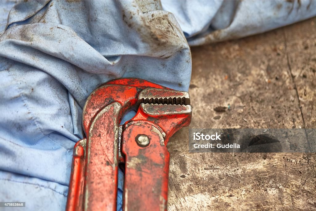 Spanner in a workshop Adjustable wrench closeup in a workshop 2015 Stock Photo