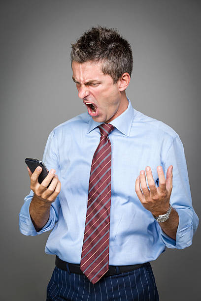 istock very angry well-dressed businessman 471855599