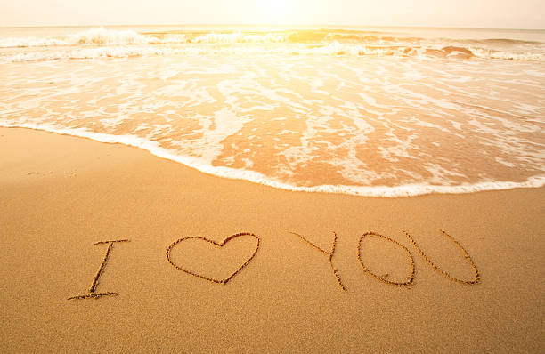 istock I Love You, text written on a beach 471857601