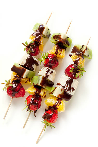 istock Fresh fruit on the skewers with chocolate 471858591