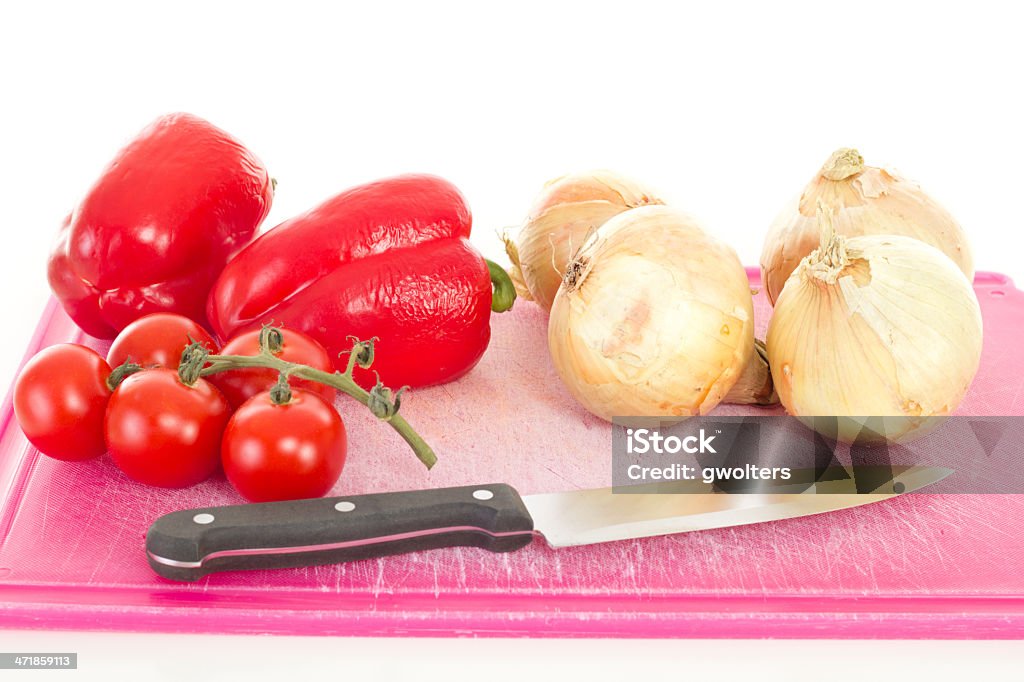 Cebollas, pimientos Tomates en picar de planchar - Foto de stock de Alimento libre de derechos