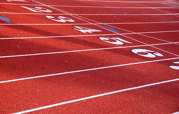 istock Track & Field Lanes at starting line 471859420