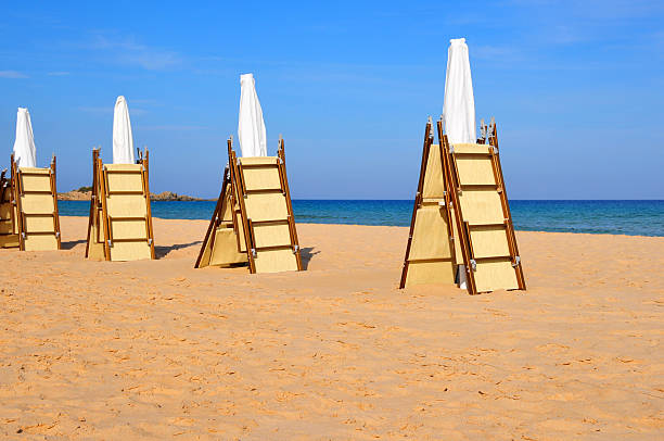 istock Domus de Maria, Sardinia, Italy: Baia Chia beach, folded chairs 471860355