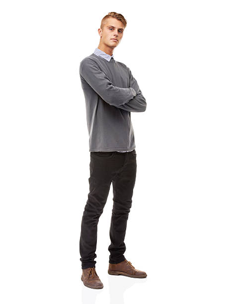 Confidence and presence - He's got them both! A full length studio shot of a stylishly dressed young man isolated on whitehttp://195.154.178.81/DATA/i_collage/pi/shoots/781221.jpg tall person stock pictures, royalty-free photos & images