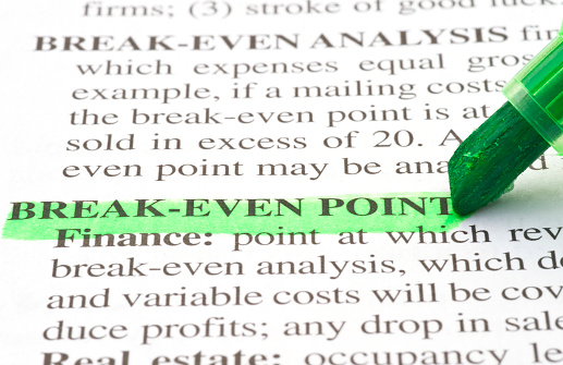 break even point highlighted with green marker. Break-even (or break even) is the point of balance between making either a profit or a loss.http://52585126.swh.strato-hosting.eu/istockphoto/lightboxdict.jpg