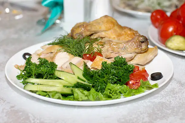 Roast chicken with vegetables and salad