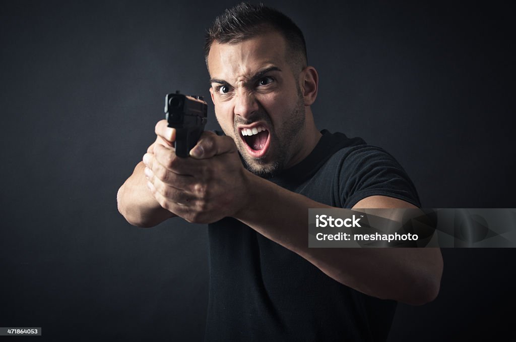 Homem apontando arma - Foto de stock de Adulto royalty-free