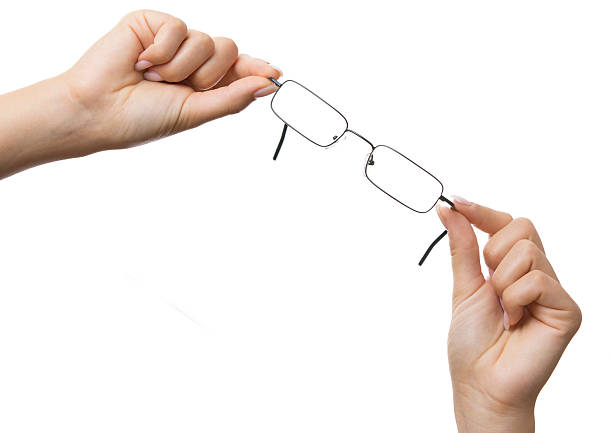 mulher mãos mostrar óculos isolado - transparent holding glass focus on foreground imagens e fotografias de stock