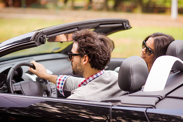istock Young couple in car 471866351