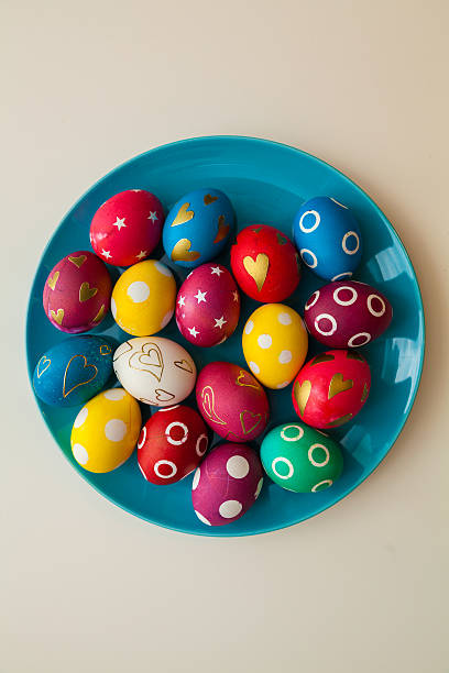 Easter eggs on tha plate stock photo