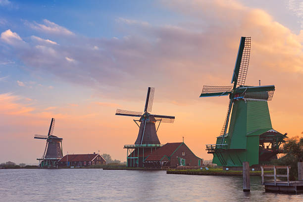 istock Traditional Dutch windmills at the 'Zaanse Schans', at sunrise 471866907