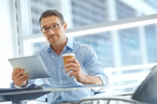 istock Reading the latest business forecasts online 471866911